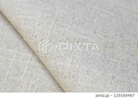 brown hemp viscose natural fabric cloth, sackcloth rough texture of textile fashion 129169467