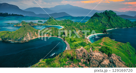 aerial view over the beautiful sunset in the mountains, madeira island, portugal. aerial view over the beautiful sunset in the mountains, madeira island, portugal. 129169720