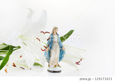 Assumption of Virgin Mary with White Lilies on soft Background 129171813