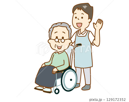 車いすの男性を介助する介護士 車いすの男性を介助する介護士 129172352