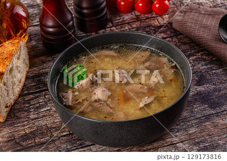 Dietary chicken soup with noodles 129173816
