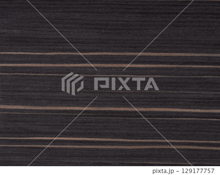 Stark, linear contrasts of mocha and licorice stripes orchestrate the bold aesthetic of this macassar veneer 129177757