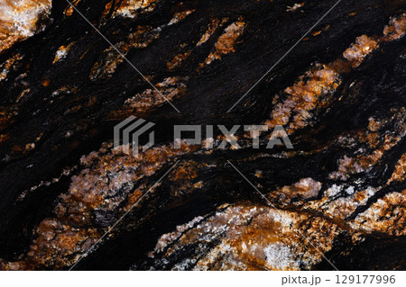 Excellent Black Magma granite texture in natural dark color. 129177996