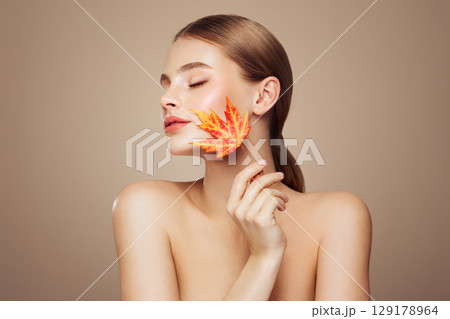 Autumn portrait of beautiful woman with clean fresh skin 129178964