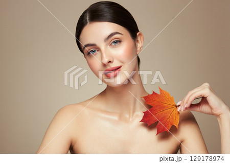 Autumn portrait of beautiful woman with clean fresh skin Autumn portrait of beautiful woman with clean fresh skin 129178974