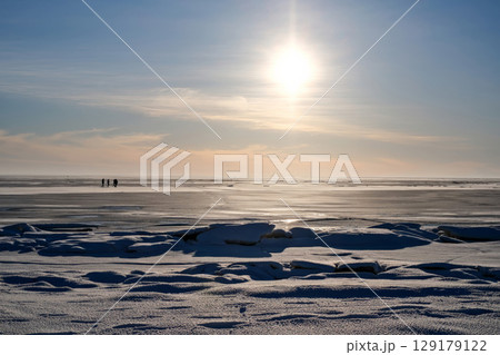 An amazing panoramic shot of the stunning winter landscape with a frozen lake and a clear blue sky An amazing panoramic shot of the stunning winter landscape with a frozen lake and a clear blue sky 129179122