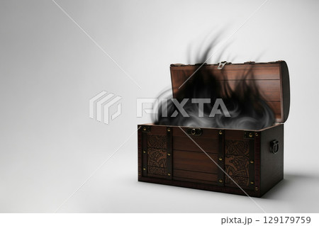 Pandora's box with black smoke escaping. Space for text. 129179759
