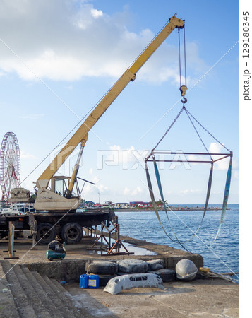 Crane for loading and lifting boats. Transportation of boats. Private boats. Resort place. Crane for loading and lifting boats. Transportation of boats. Private boats. Resort place. 129180345