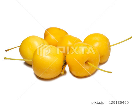 early variety of apples. Small yellow apples on a white background. Chinese gold. early variety of apples. Small yellow apples on a white background. Chinese gold. 129180490