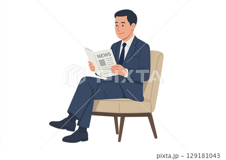 社内報を読んでいる中堅社員の男性 129181043