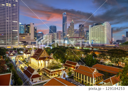 Wat Pathumwanaram Temple in the morning, view from Siam Paragon car park in Bangkok, Thailand. 129184253