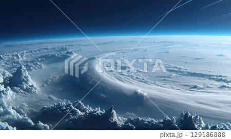 A breathtaking view of swirling storm clouds and atmospheric patterns on Earth, seen from high above in space 129186888