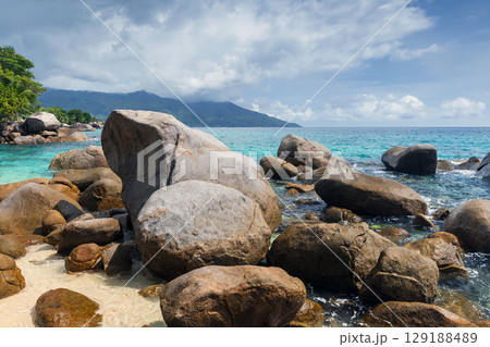 Tropical Coastal Landscape Featuring Granite Rocks and Turquoise Waters Tropical Coastal Landscape Featuring Granite Rocks and Turquoise Waters 129188489
