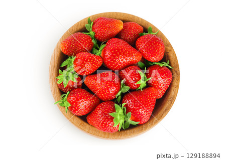 Strawberry in a wooden bowl isolated on white background, Top view. Flat lay. 129188894