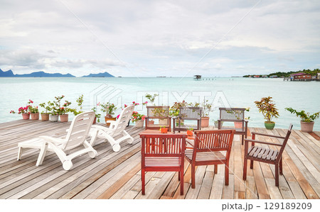Wooden platform with seats by the sea, holiday relaxation concept, Borneo, Malaysia. 129189209