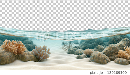 A rocky beach with a clear blue ocean in the background 129189500