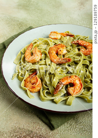 tagliatelle with spinach, in cream sauce, with shrimp, homemade, no people, tagliatelle with spinach, in cream sauce, with shrimp, homemade, no people, 129189759