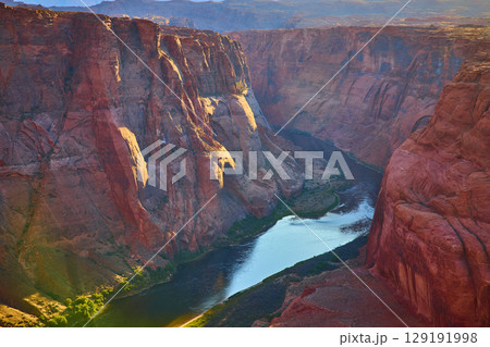 Horseshoe Bend Colorado River Red Cliffs at Sunset Aerial Fly Over Horseshoe Bend Colorado River Red Cliffs at Sunset Aerial Fly Over 129191998