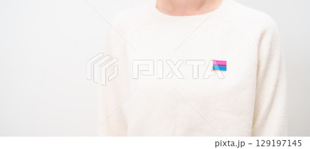 Bisexuality Celebrate Day and LGBT pride month, LGBTQ or LGBTQIA concept. Hand holding purple, pink and blue flag shape for Lesbian, Gay, Bisexual, Transgender, Queer, Pansexual, Marriage Equality Law Bisexuality Celebrate Day and LGBT pride month, LGBTQ or LGBTQIA concept. Hand holding purple, pink and blue flag shape for Lesbian, Gay, Bisexual, Transgender, Queer, Pansexual, Marriage Equality Law 129197145