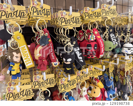 Keychains display featuring various popular characters in Penang's souvenir shop Keychains display featuring various popular characters in Penang's souvenir shop 129198738
