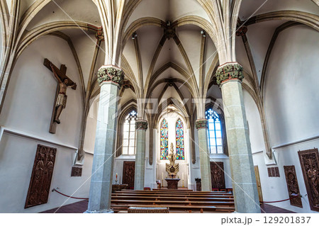 St. Stephans cathedral in Passau, Germany is an old white church with green metal domes on top of the towers St. Stephans cathedral in Passau, Germany is an old white church with green metal domes on top of the towers 129201837