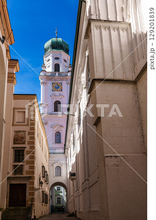 St. Stephans cathedral in Passau, Germany is an old white church with green metal domes on top of the towers 129201839