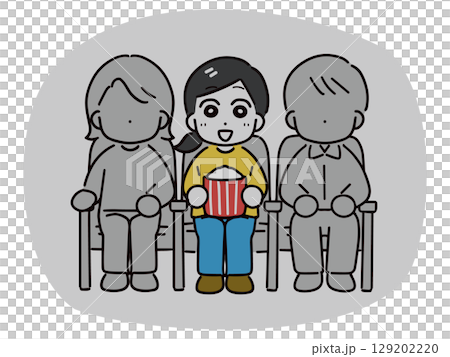 Smiling woman watching a movie alone at the cinema 129202220