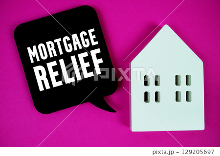 Mortgage Relief text with house model on pink background 129205697