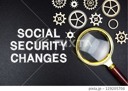 Social Security Changes text message with magnifying glass on black background Social Security Changes text message with magnifying glass on black background 129205708