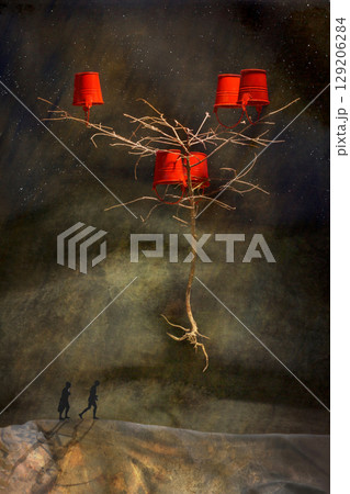 Surreal picture of a tree with red buckets and a man and a woman walking along the road Surreal picture of a tree with red buckets and a man and a woman walking along the road 129206284
