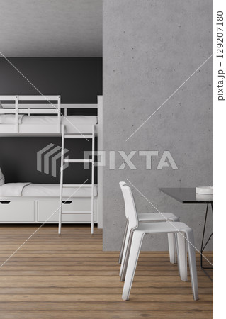 This hostel interior showcases a functional layout with a bunk bed setup, a simple dining table, and wooden flooring. A sleek, minimalist aesthetic enhances the inviting atmosphere for travelers This hostel interior showcases a functional layout with a bunk bed setup, a simple dining table, and wooden flooring. A sleek, minimalist aesthetic enhances the inviting atmosphere for travelers 129207180