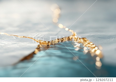 A serene backdrop of frosty water features soft gold veins running along cracks in the ice, creating a stunning visual effect that exudes modern luxury and tranquility A serene backdrop of frosty water features soft gold veins running along cracks in the ice, creating a stunning visual effect that exudes modern luxury and tranquility 129207211