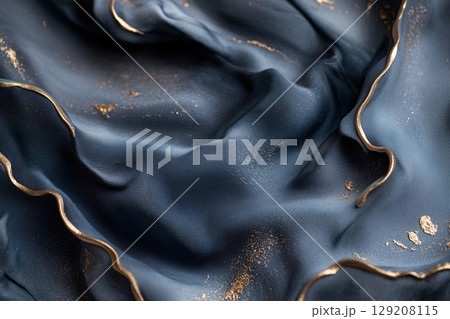 Deep blue ocean waves gently undulate, reflecting soft light, creating a velvety texture that evokes feelings of calm and luxury in a serene setting 129208115