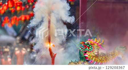 Traditional Chinese firecrackers are exploding with flashes and smoke in Lunar new year. 129208367