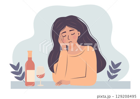 Sad woman sits at table with bottle and glass of wine. Alcohol abuse depression problem of female. Sad woman sits at table with bottle and glass of wine. Alcohol abuse depression problem of female. 129208495