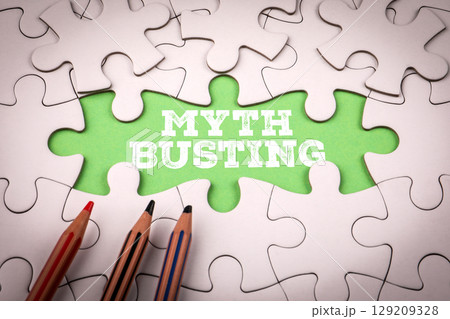 Myth Busting Concept in Puzzle Pieces Background Myth Busting Concept in Puzzle Pieces Background 129209328