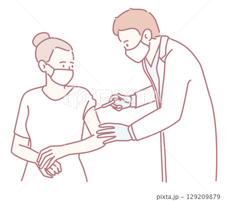 Dedicated Healthcare Worker Administering a Vaccine to a Patient for their wellbeing and protection 129209879
