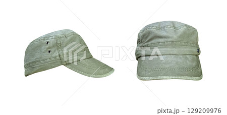 Two green hats, separate on a white background. 129209976