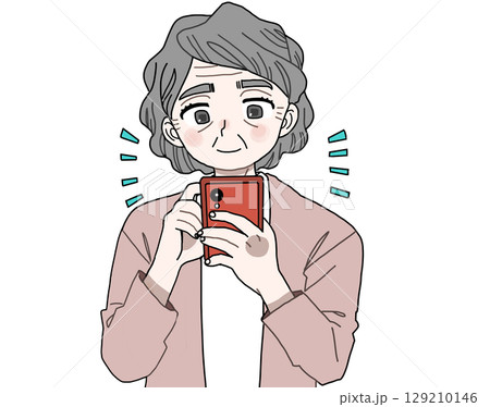 スマホ操作する高齢者女性 129210146