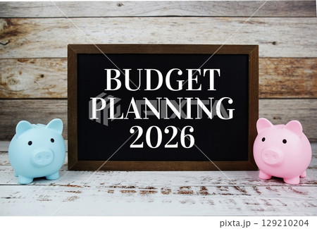 Budget Planning 2026 typography text message with piggy saving on wooden background 129210204
