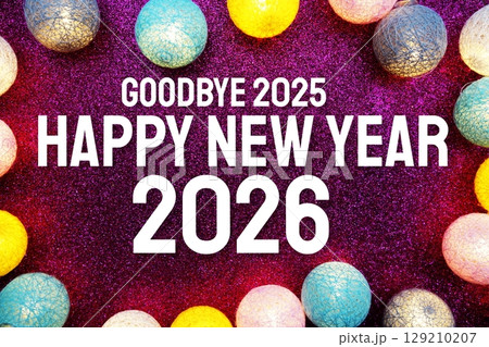 Happy New Year 2026 text and LED cotton balls decoration on pink glitter background 129210207