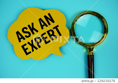 Ask an Expert text with speech bubble and magnifying glass on blue background Ask an Expert text with speech bubble and magnifying glass on blue background 129210278