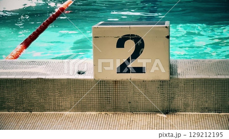 Swimming pool starting block number two 2 129212195
