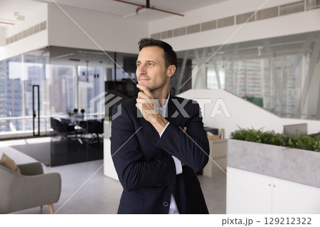 Pensive middle-aged Hispanic businessman ponder on solution or idea Pensive middle-aged Hispanic businessman ponder on solution or idea 129212322