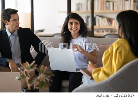Indian woman conduct meeting with staff members in office Indian woman conduct meeting with staff members in office 129212617