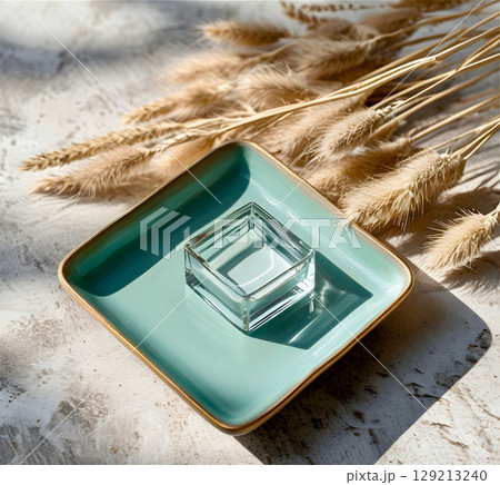 perfume bottle on the sand 129213240