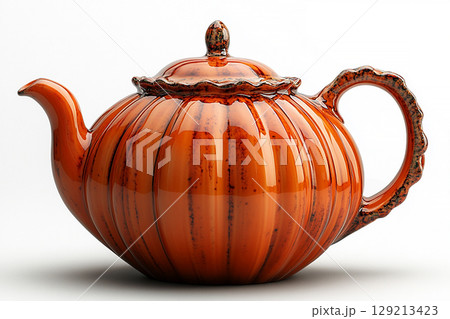 Ceramic teapot in shape of a orange pumpkin in a rustic style on a white background. Ceramic teapot in shape of a orange pumpkin in a rustic style on a white background. 129213423