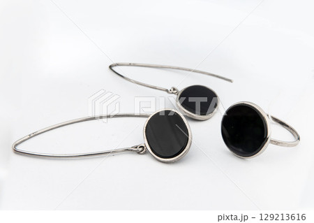 Silver jewels collection with crystals in minimalism style. Silver set of earrings and silver necklace 129213616