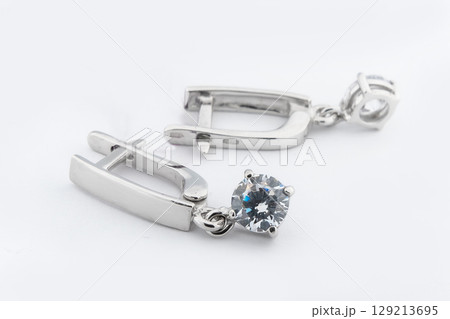 Luxury silver round earrings big jewelry for women isolated on white background, clipping path included Luxury silver round earrings big jewelry for women isolated on white background, clipping path included 129213695