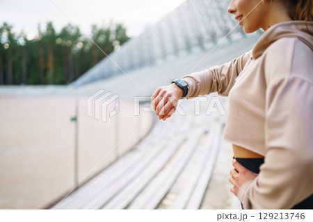 A young female athlete in special clothing is training on the court. Concept of sport, health. 129213746